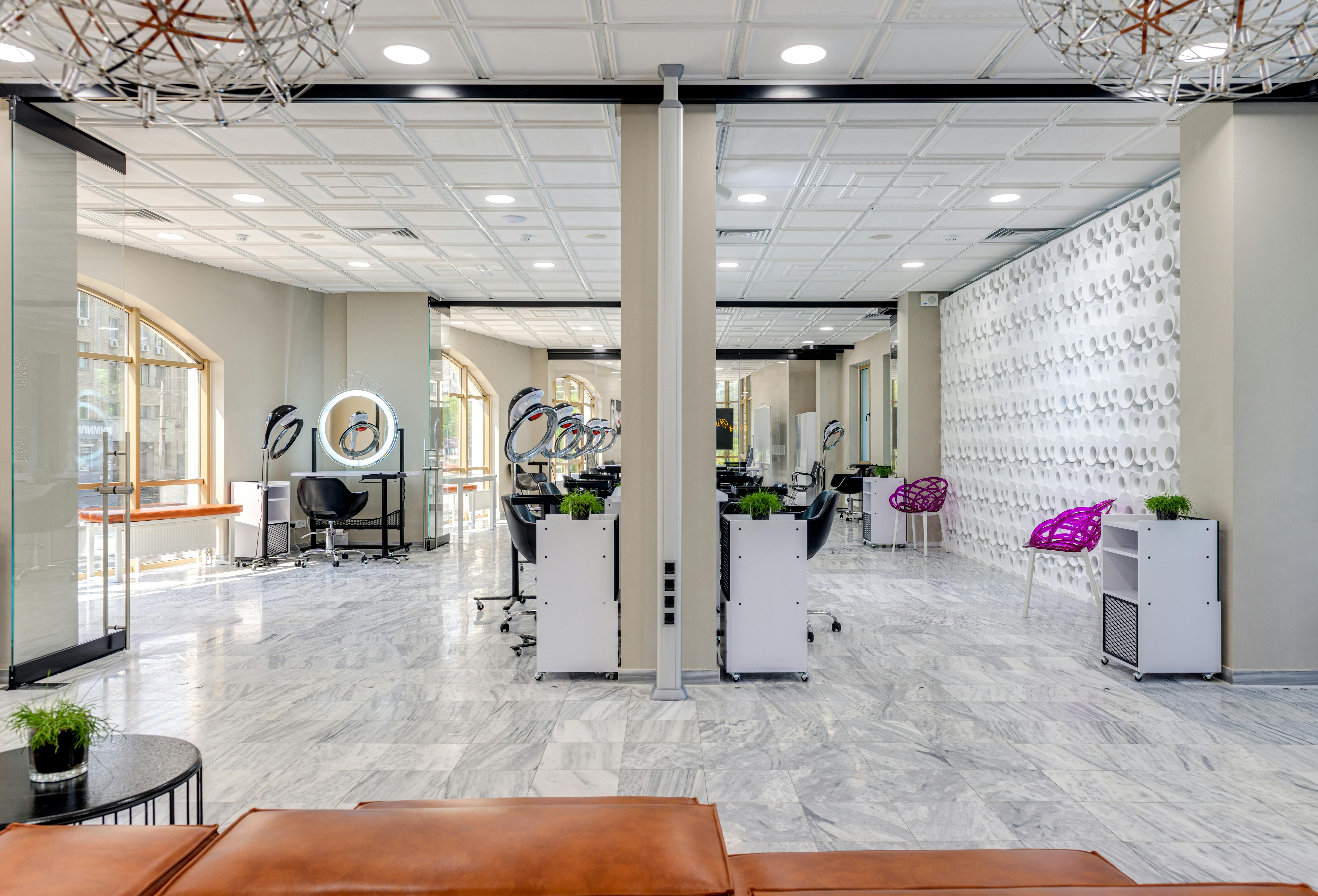 Afro hair styling tools and products arranged professionally, representing pricing strategy